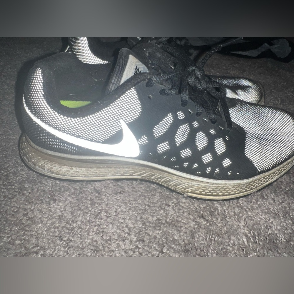 Reflective black nike shoes